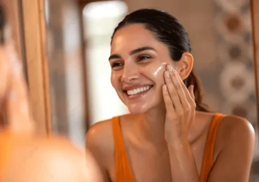 pngtree-a-close-up-shot-of-woman-applying-skincare-products-on-her-image_17904532